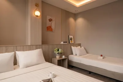 Deluxe-Dreibettzimmer — The Cozy Hotel